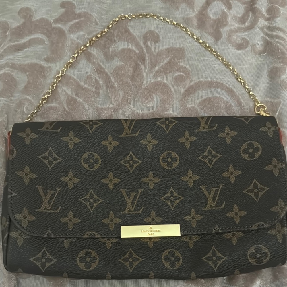 Louis Vuitton Black and Gold Monogram Clutch